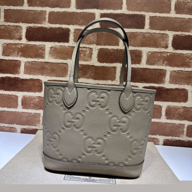 G*u*i shopping bags